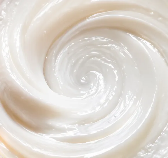 Liquefied starch slurry being stirred in a stainless steel vessel ahead of saccharification